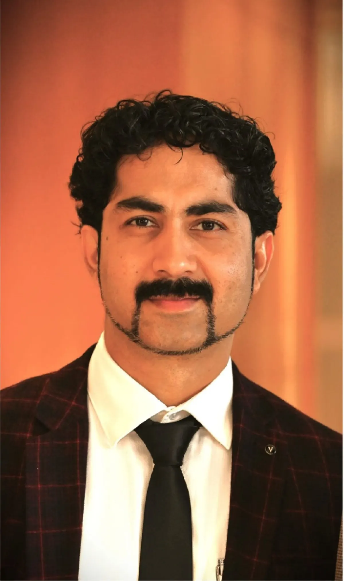 Santosh Ramrakhiani — Managing Director